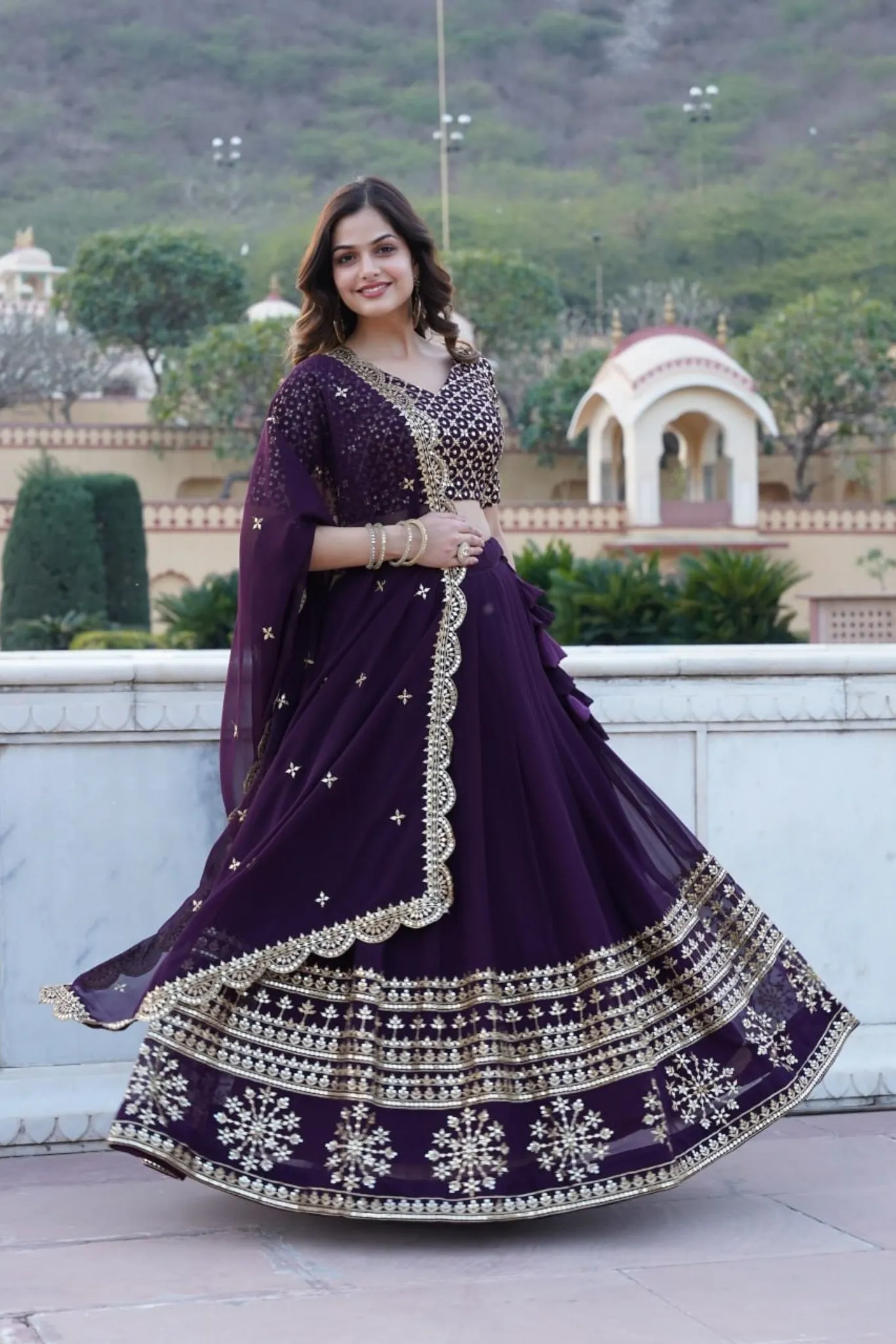 Georgette Flared Lehenga Choli With Sequins And Embroidered Work