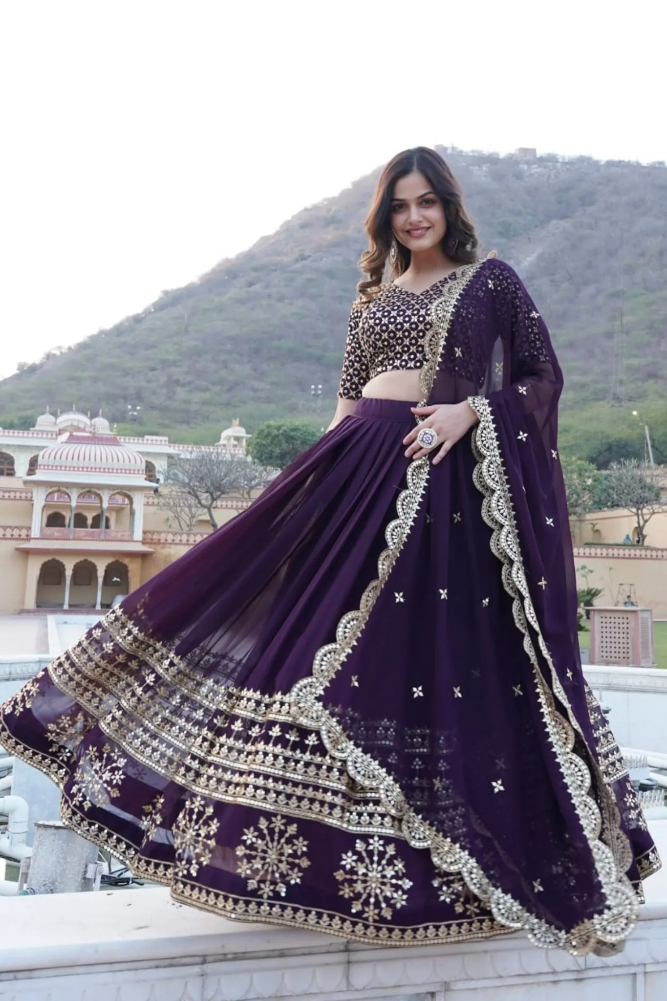 Georgette Flared Lehenga Choli With Sequins And Embroidered Work