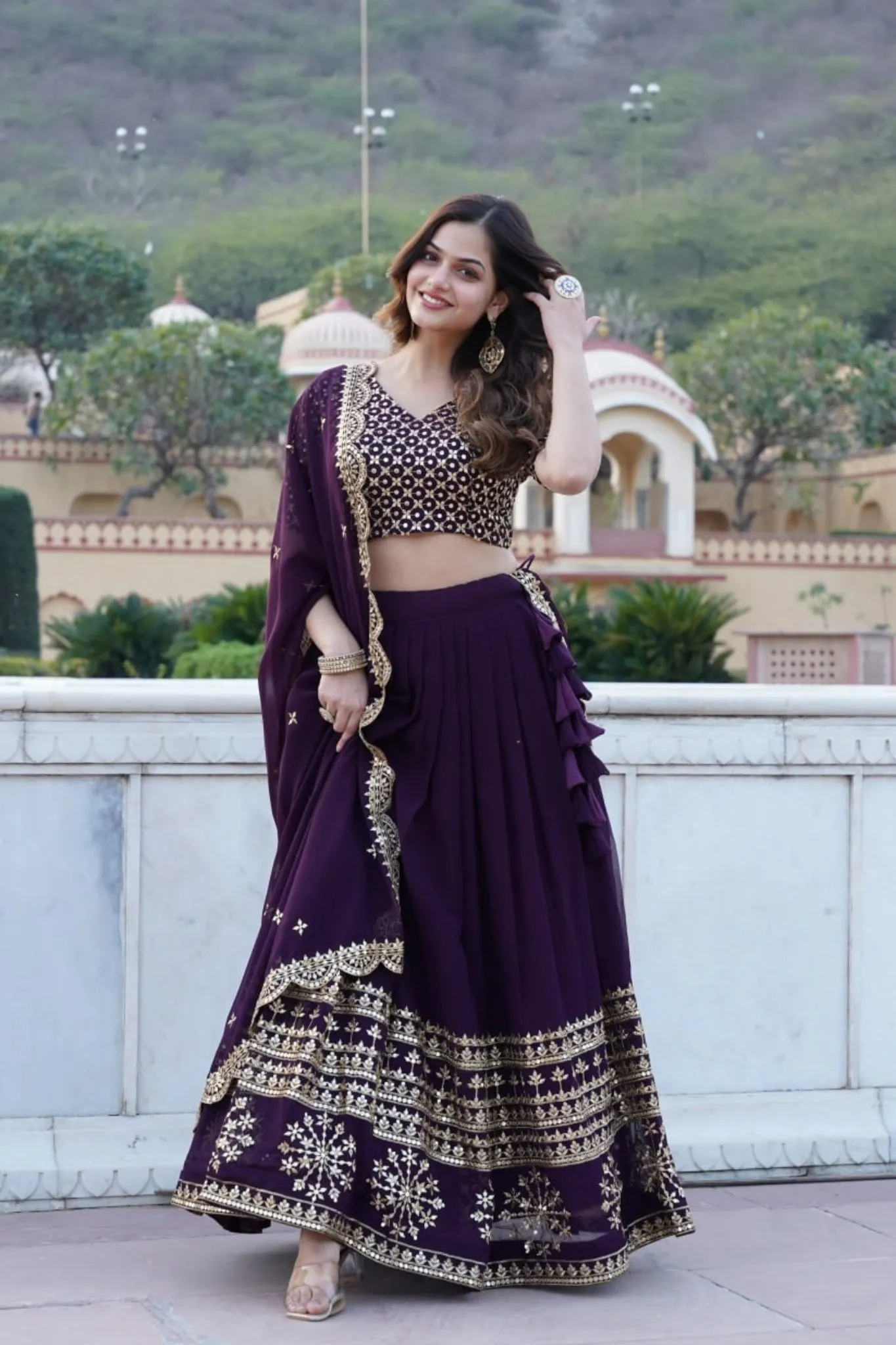 Georgette Flared Lehenga Choli With Sequins And Embroidered Work