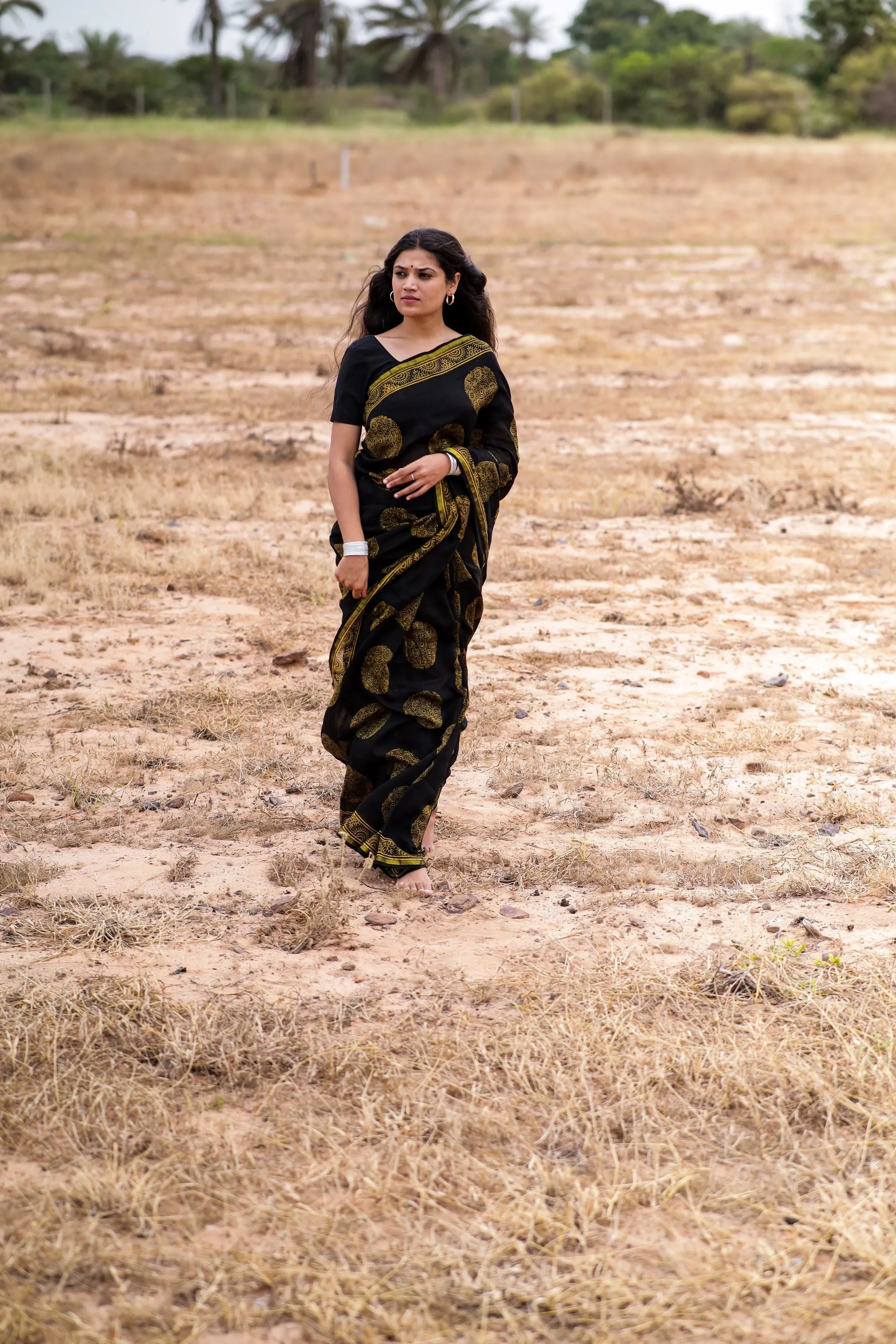 Jharokha -Black and green floral silk cotton Ajrakh handblockprinted saree