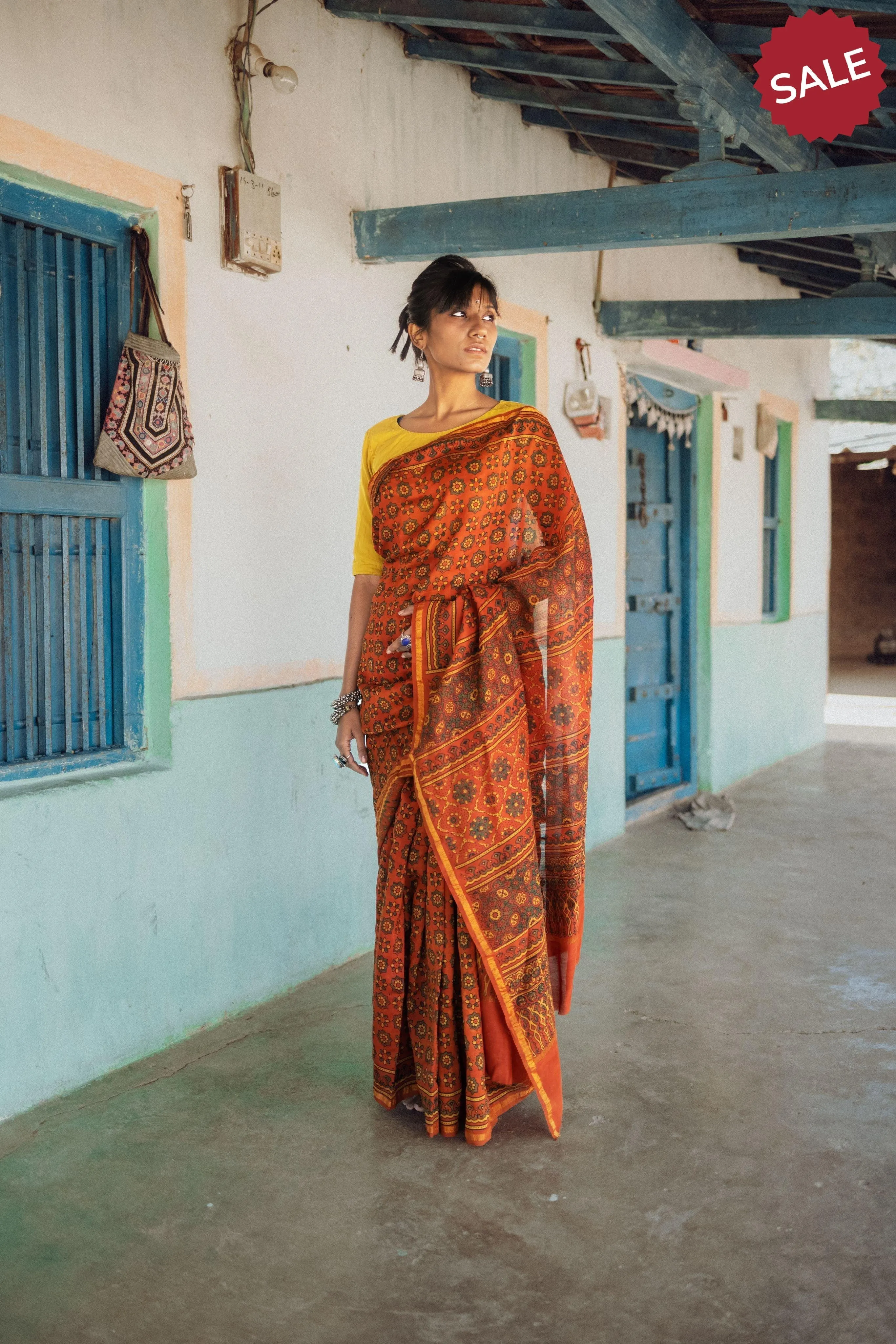 Jharokha -Orange green silk cotton Ajrakh handblockprinted saree