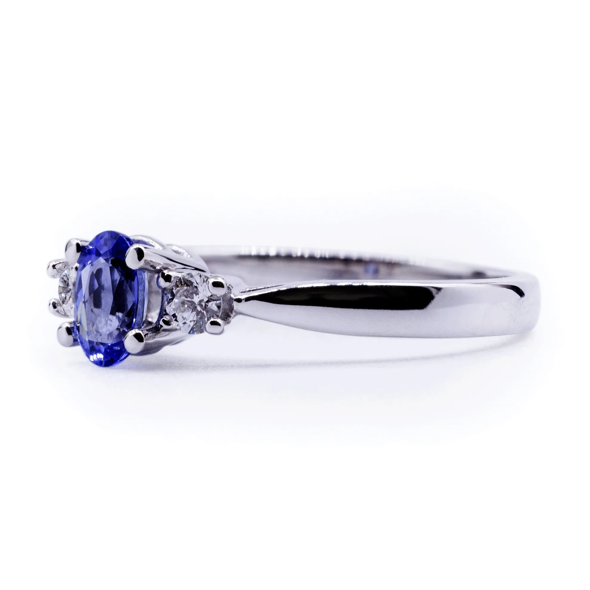 Oval Natural Tanzanite with Diamond Side Stones Ring