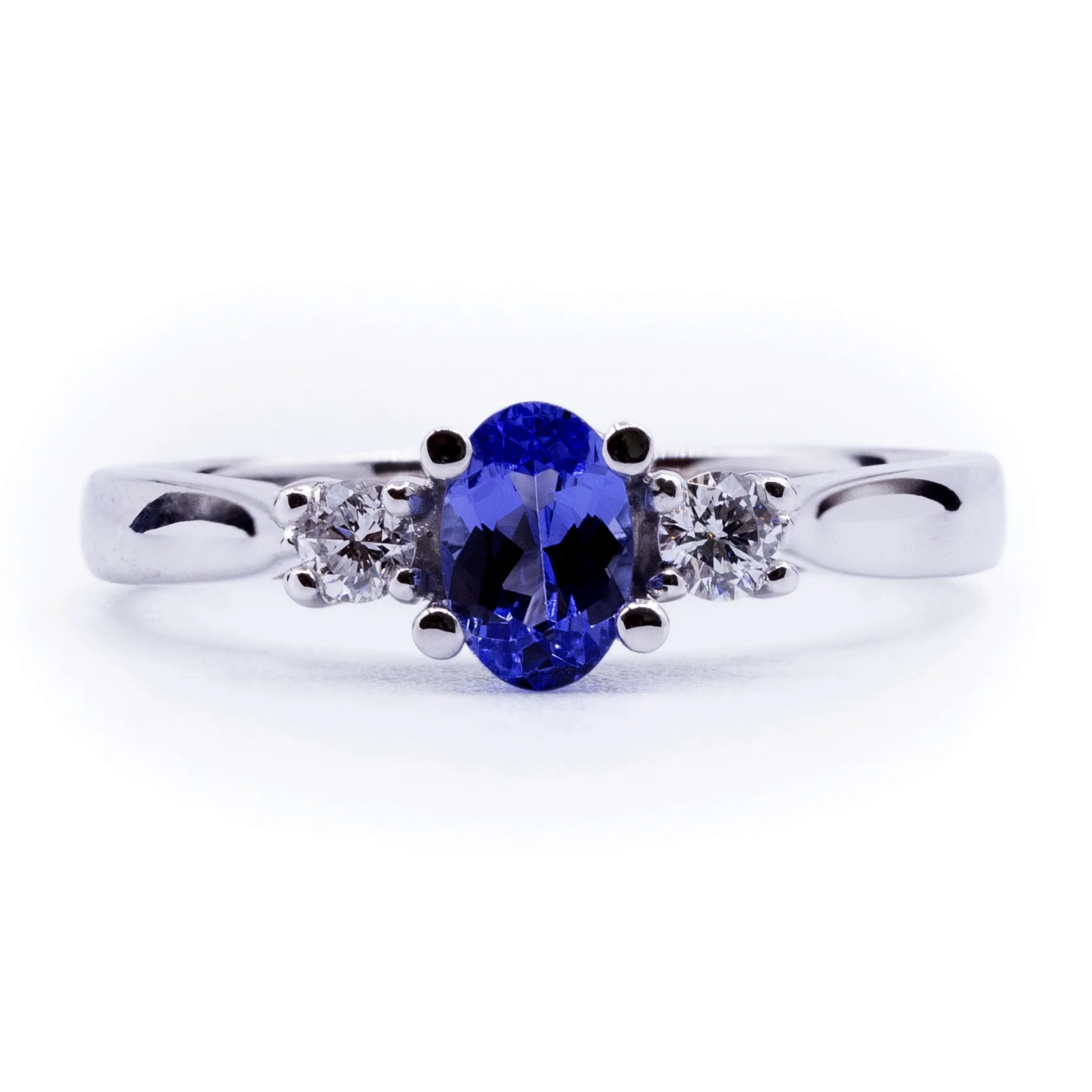 Oval Natural Tanzanite with Diamond Side Stones Ring